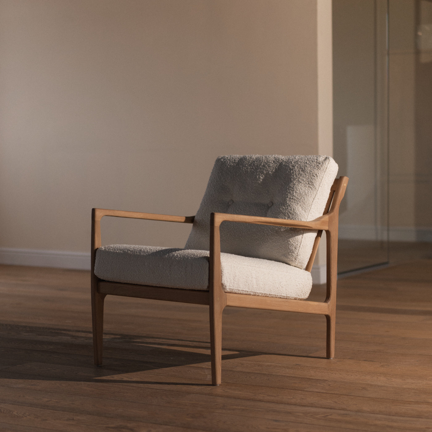 White boucle lounge chair