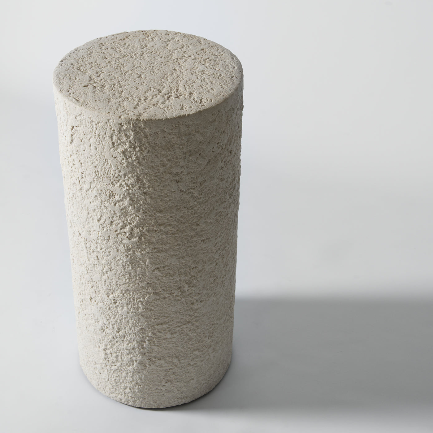 Off white plaster plinth