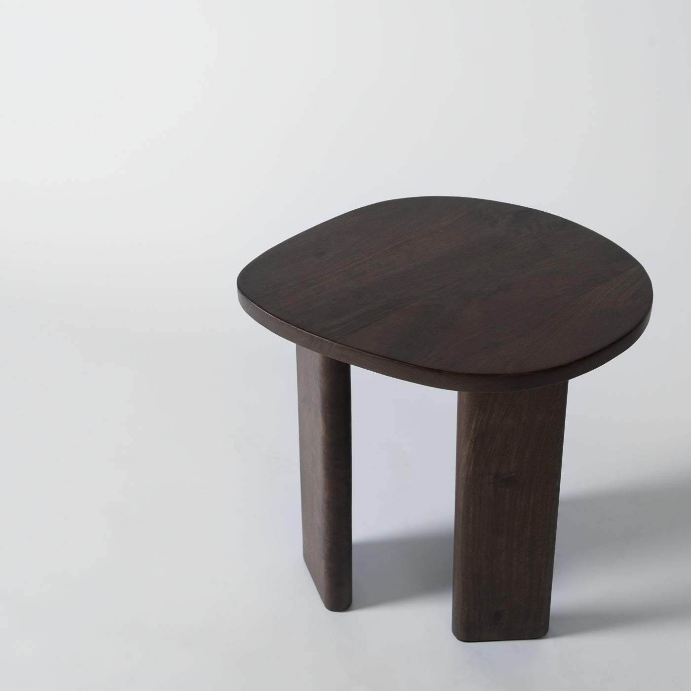 Wooden side table with a dark finish