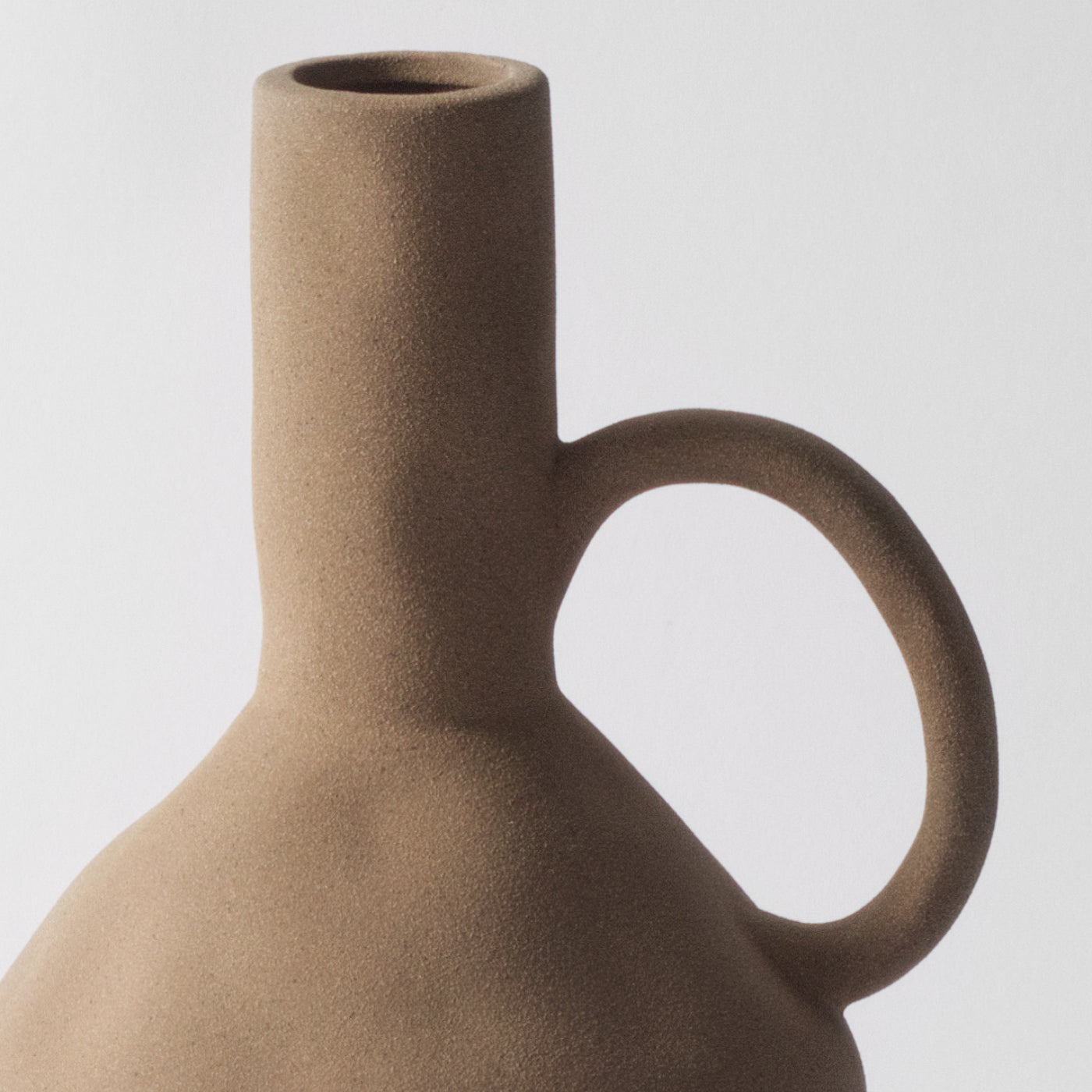 Tall vase with handle