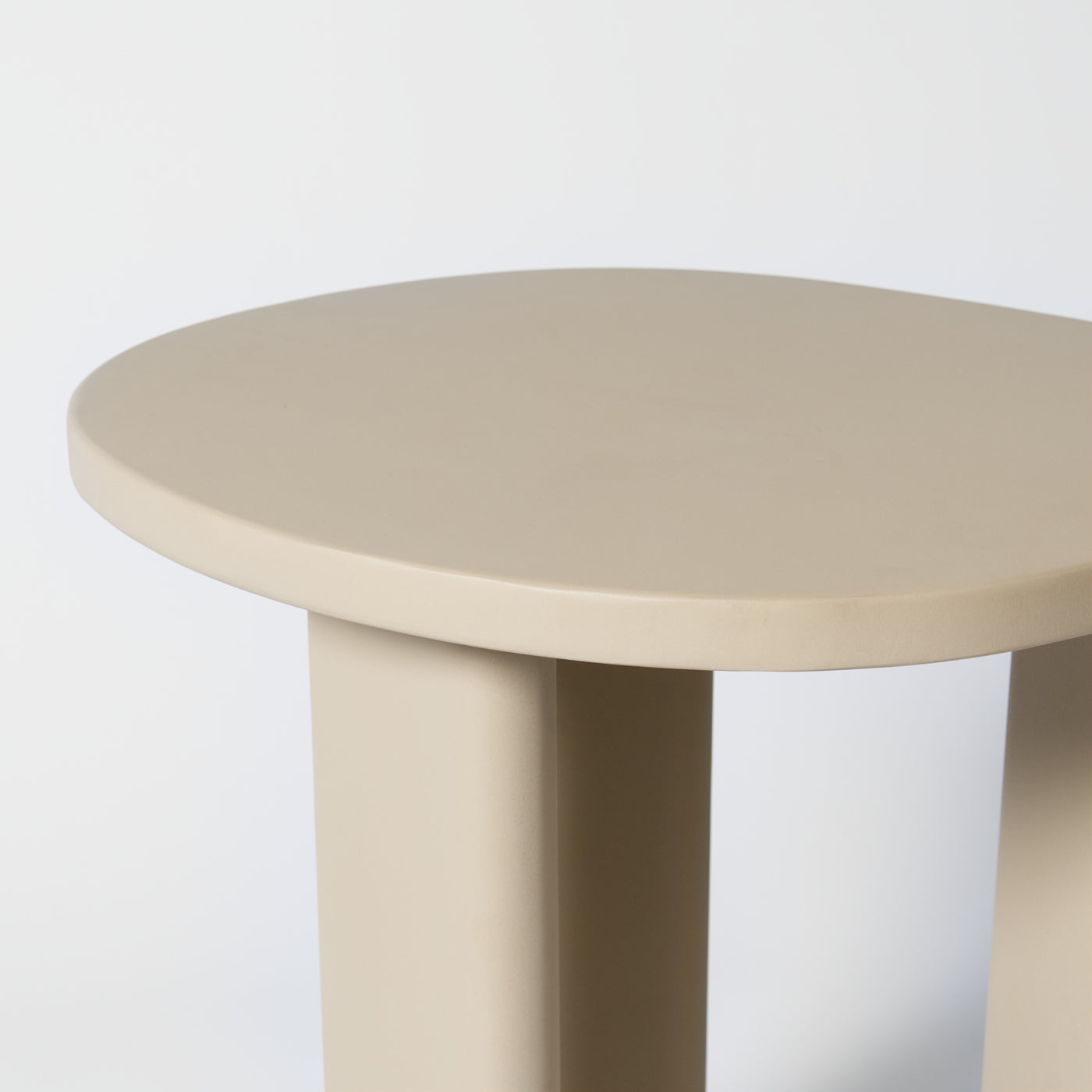 Taupe side table with organic shape