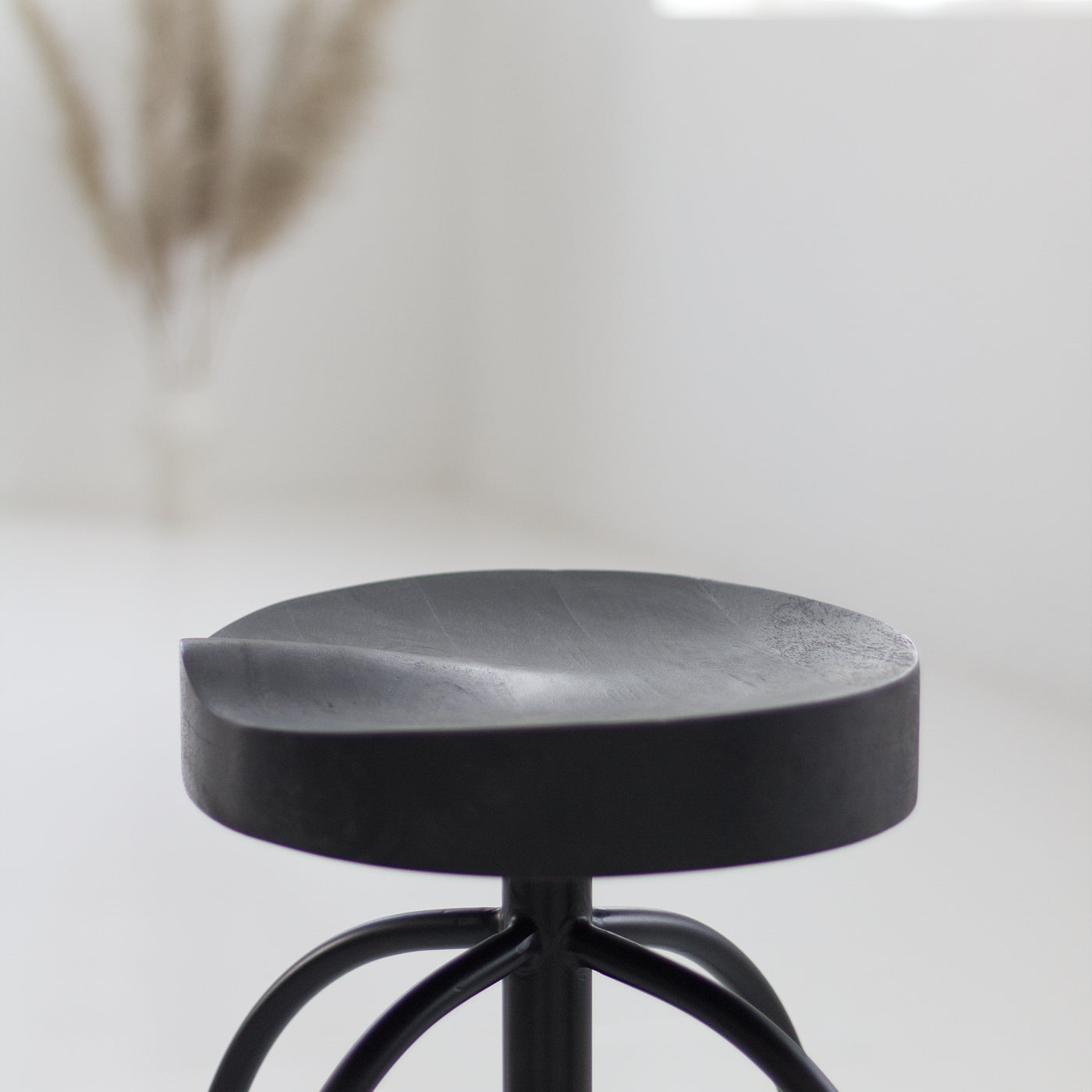 Black swivel bar stool