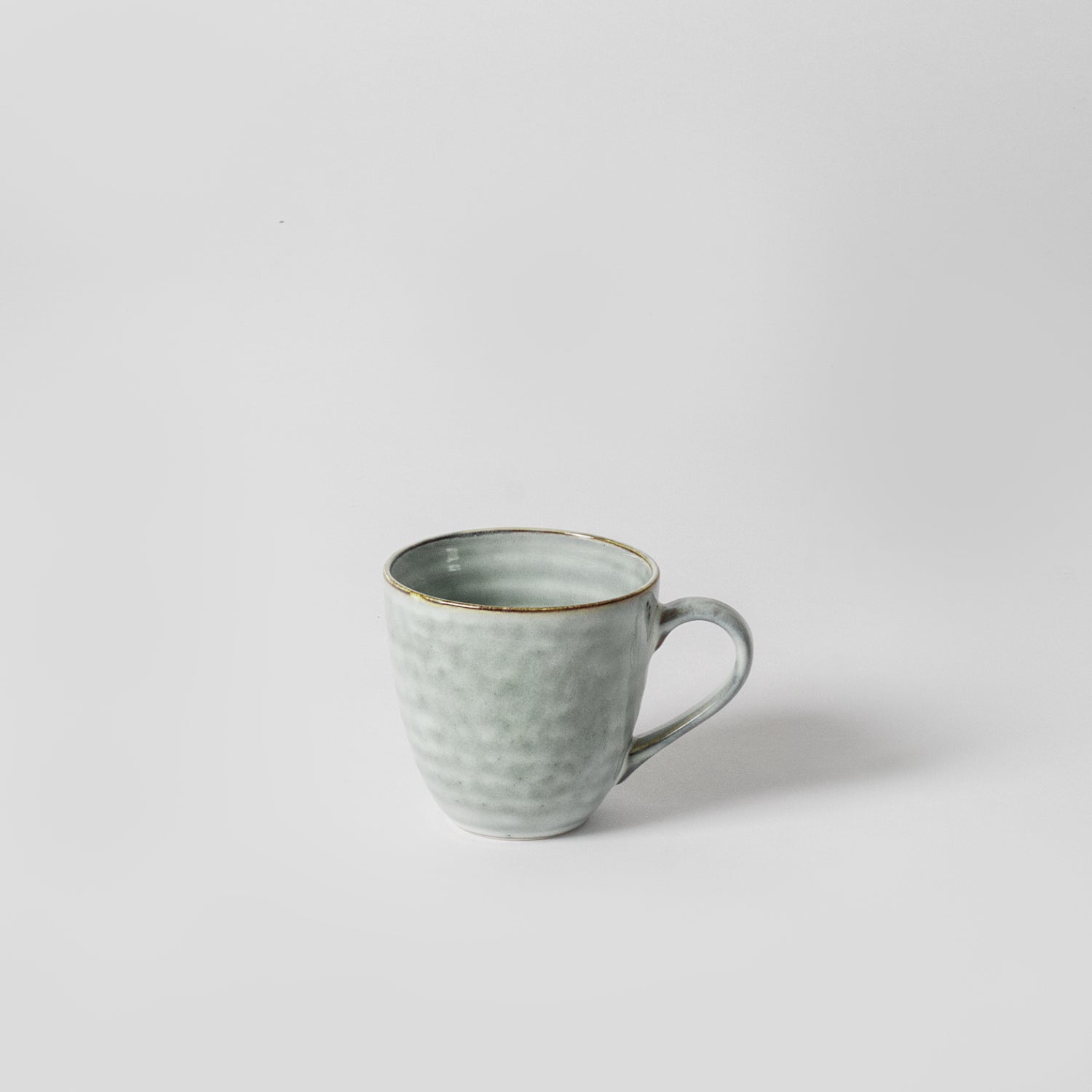 Blue speckled coffee mugs