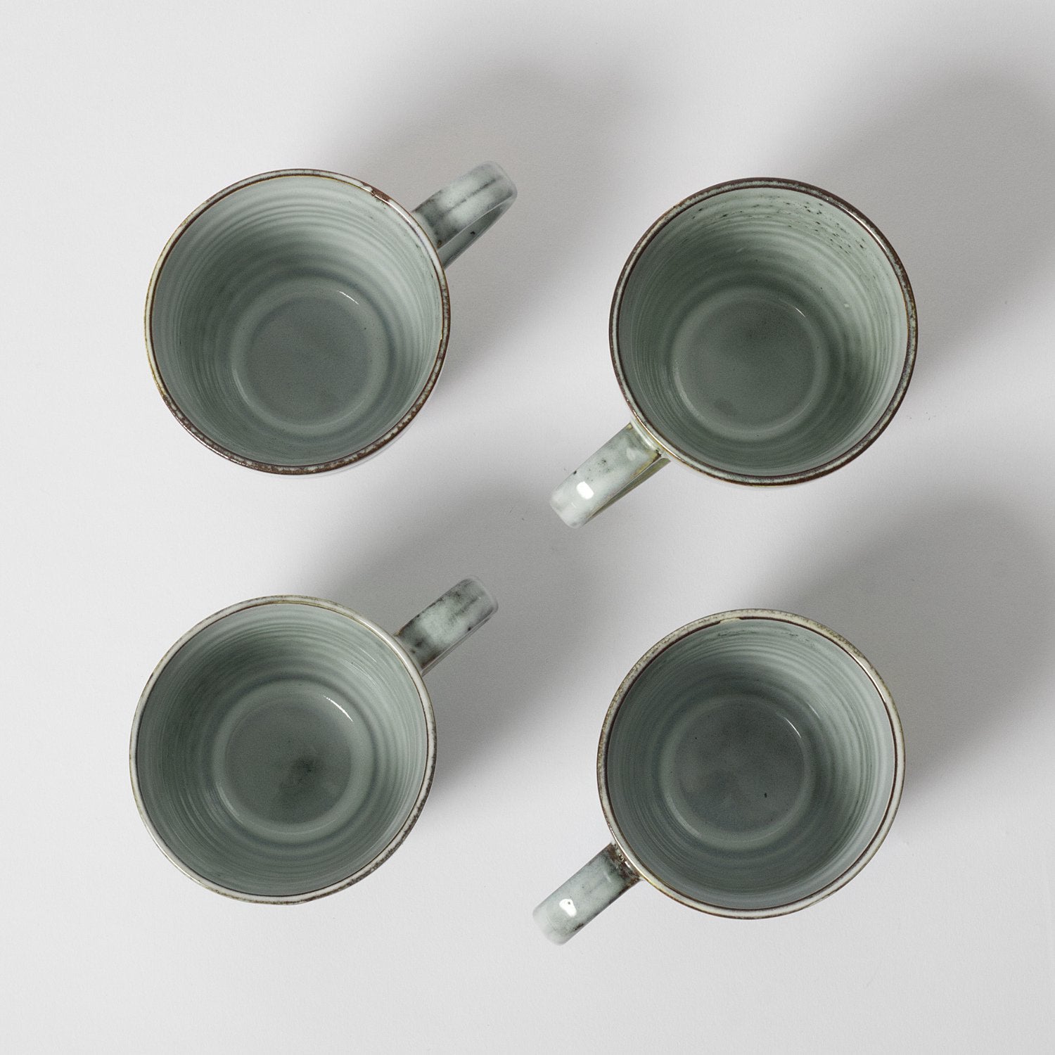 Blue speckled coffee mugs