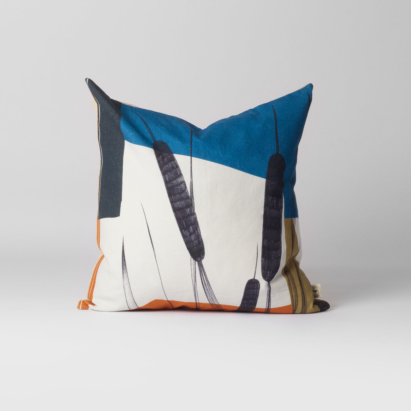 blue and white pattern cushion