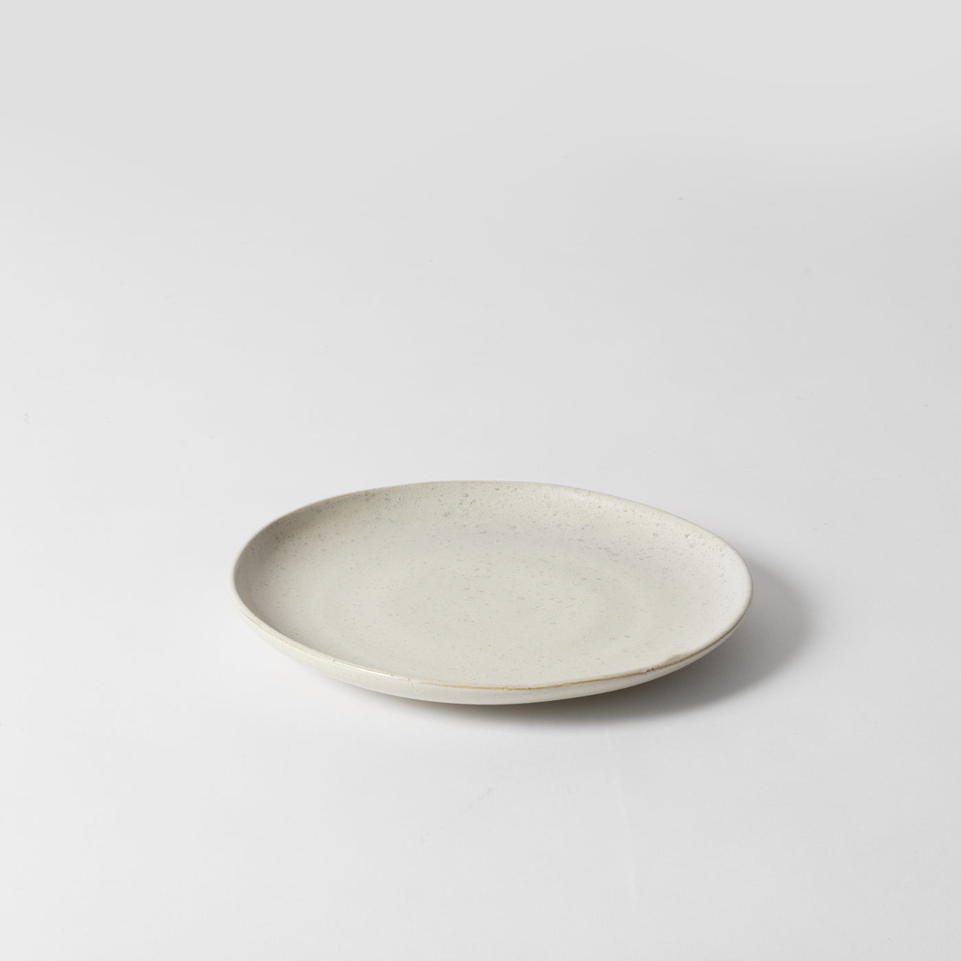 cream porcelain side plate