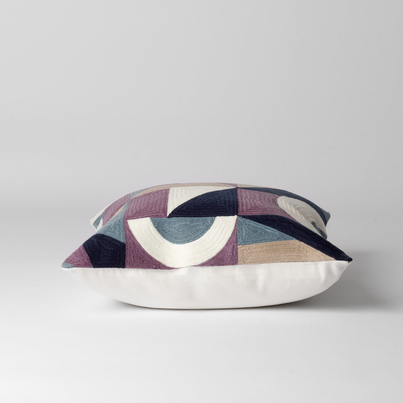 Purple and white abstract cushion