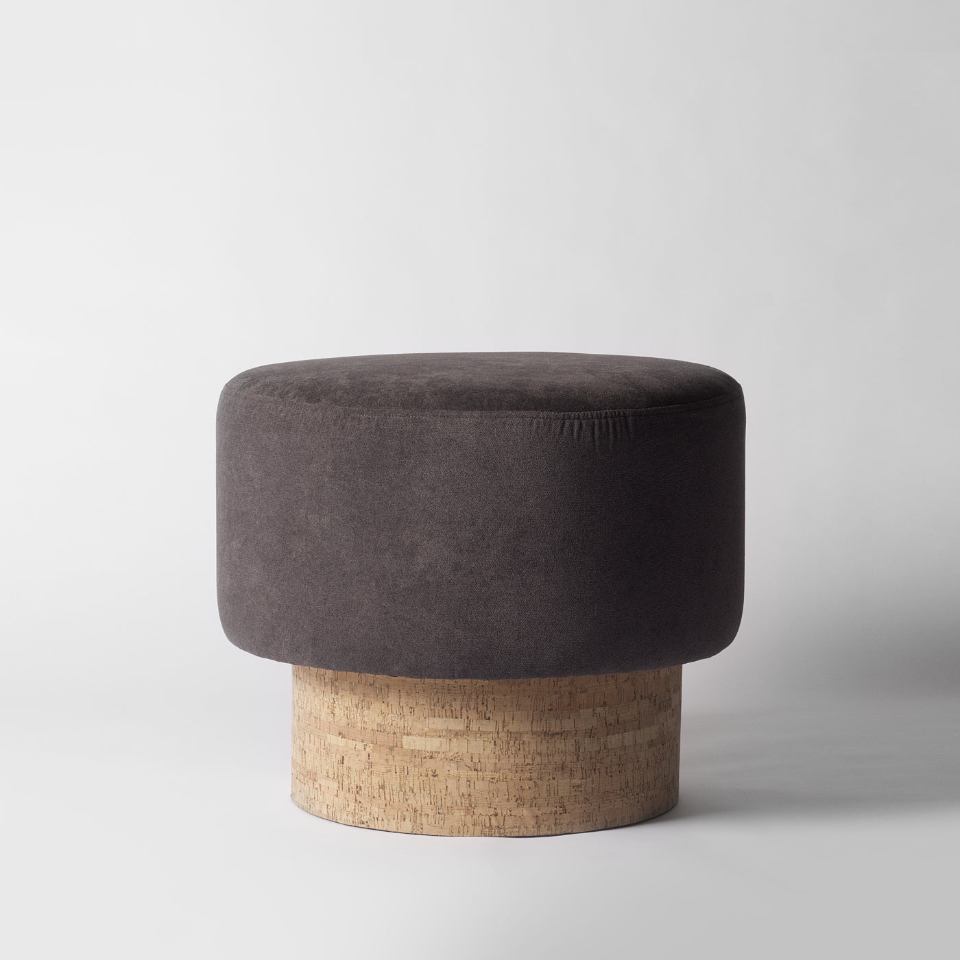 Round grey pouffe