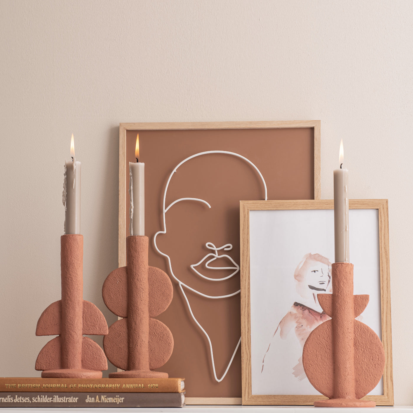 Orange candle stick holder