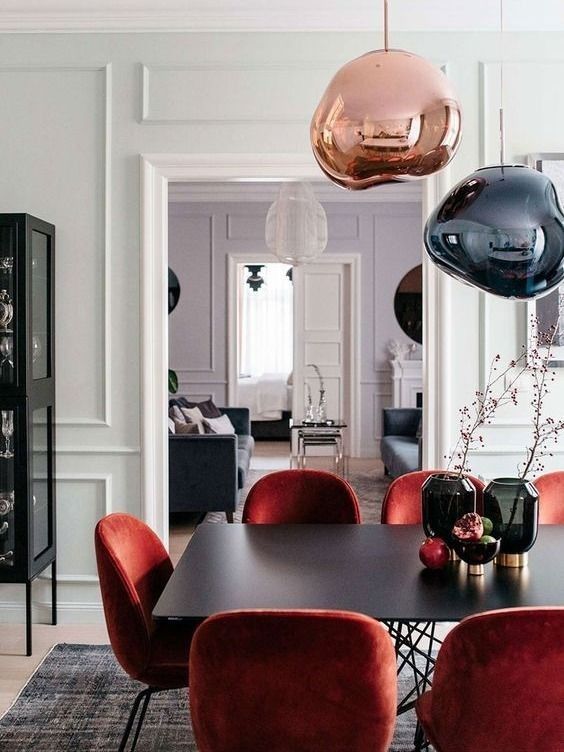 Tom dixon lights over dining table 