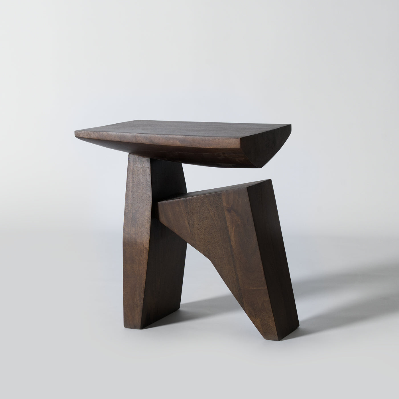Solid dark wood accent stool