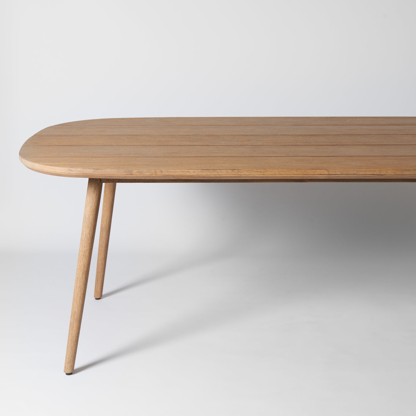 Curved outdoor dining table