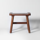 Dark wooden foot stool
