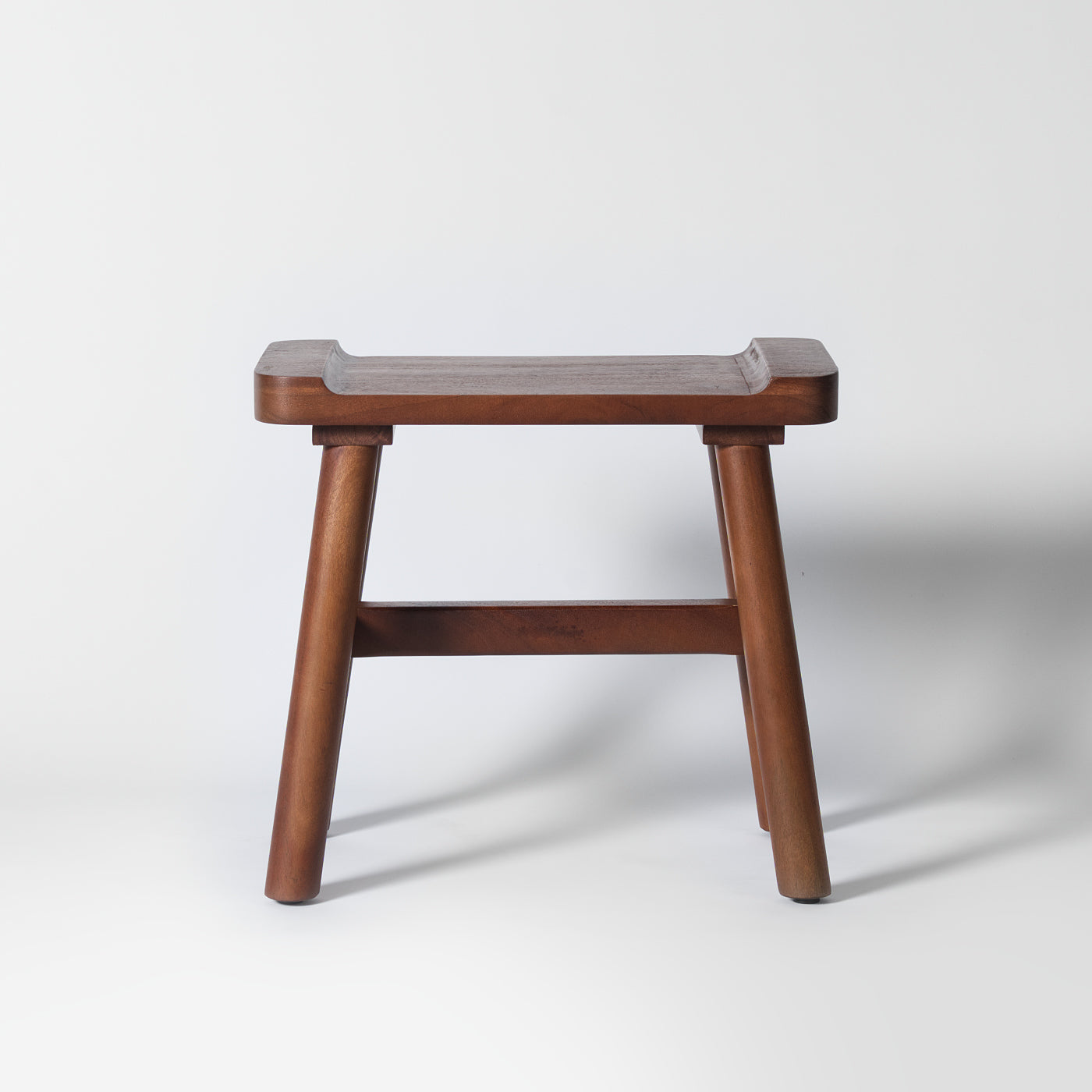 Dark wooden foot stool