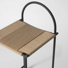 Black metal counter stool with handwoven rope seat