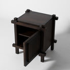 Dark wood bedside table