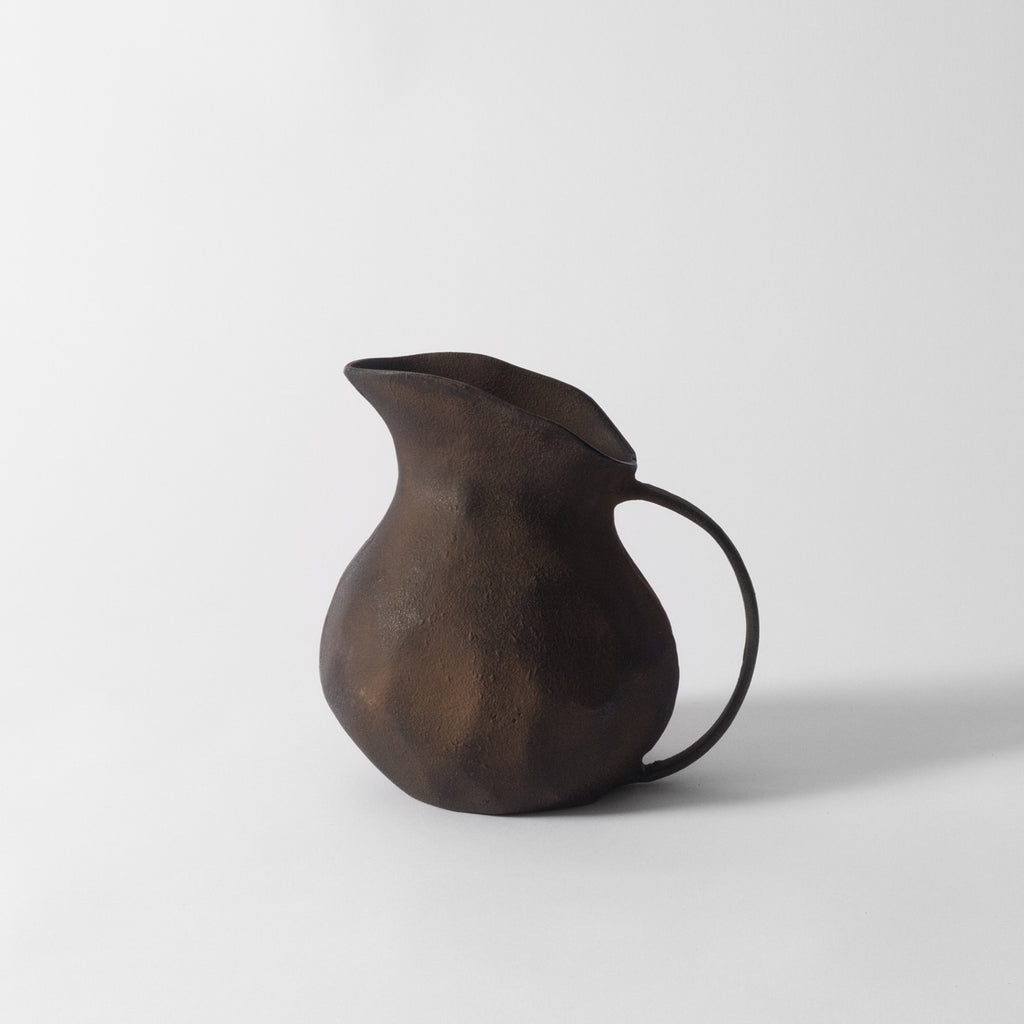 Rust flower jug