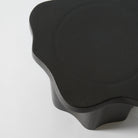 Organic shaped stoneware sidetable