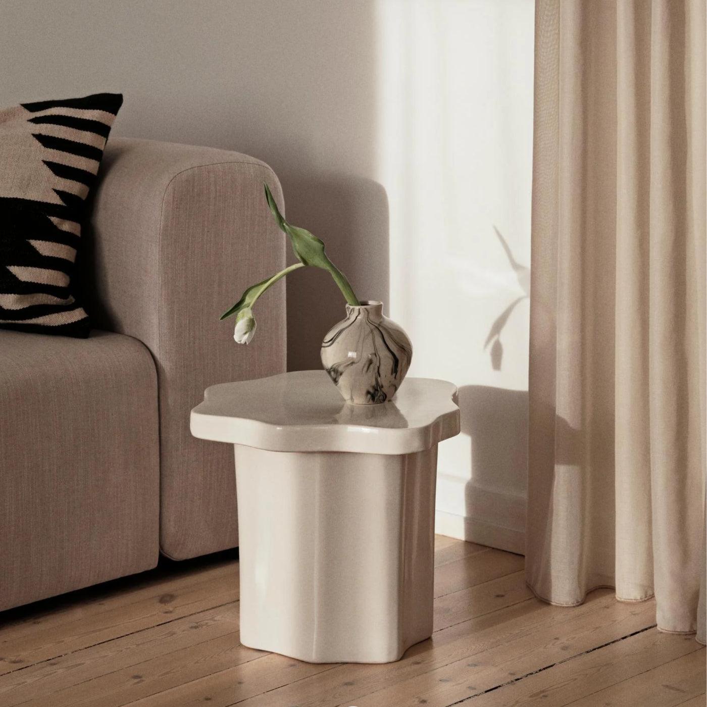 Organic shaped ceramic side table