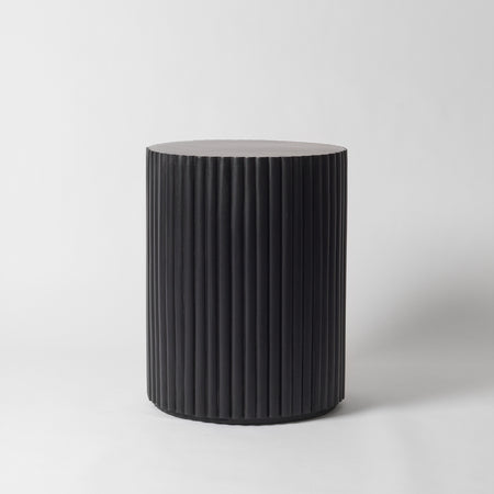 Black ribbed side table