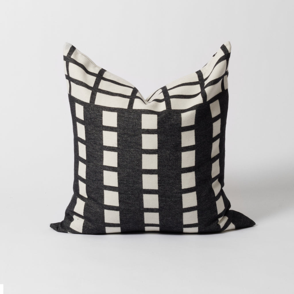 Black and white patterned cushion